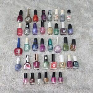 Mixed lot of  Nail Polish Lot of 30 L.A. Colors, Sinful Colors, Kiss, Maybelline